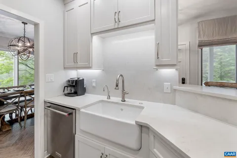 a kitchen with a sink and a window