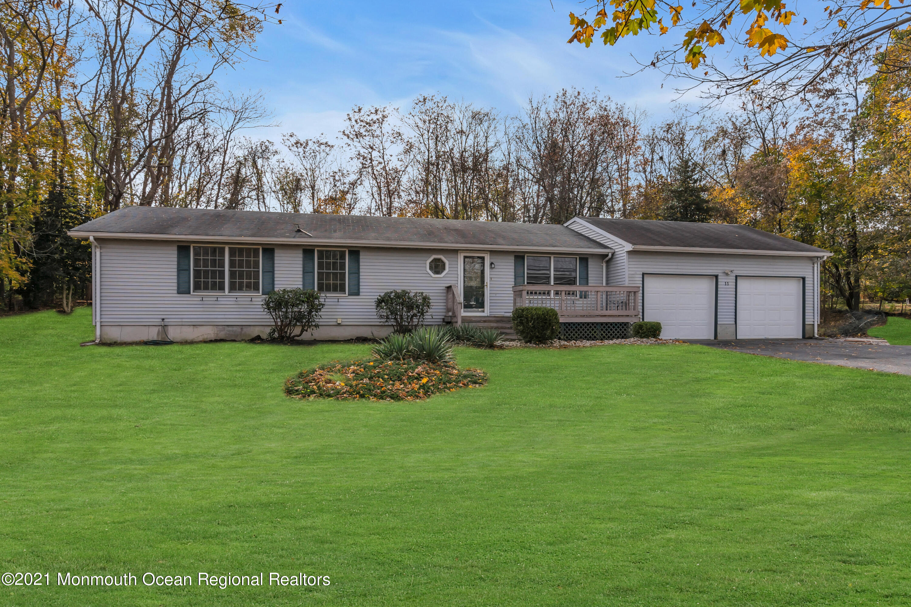 11 Tennent Road Morganville, NJ 07751 - Photo 1 of 20 a front view of house with yard and green space