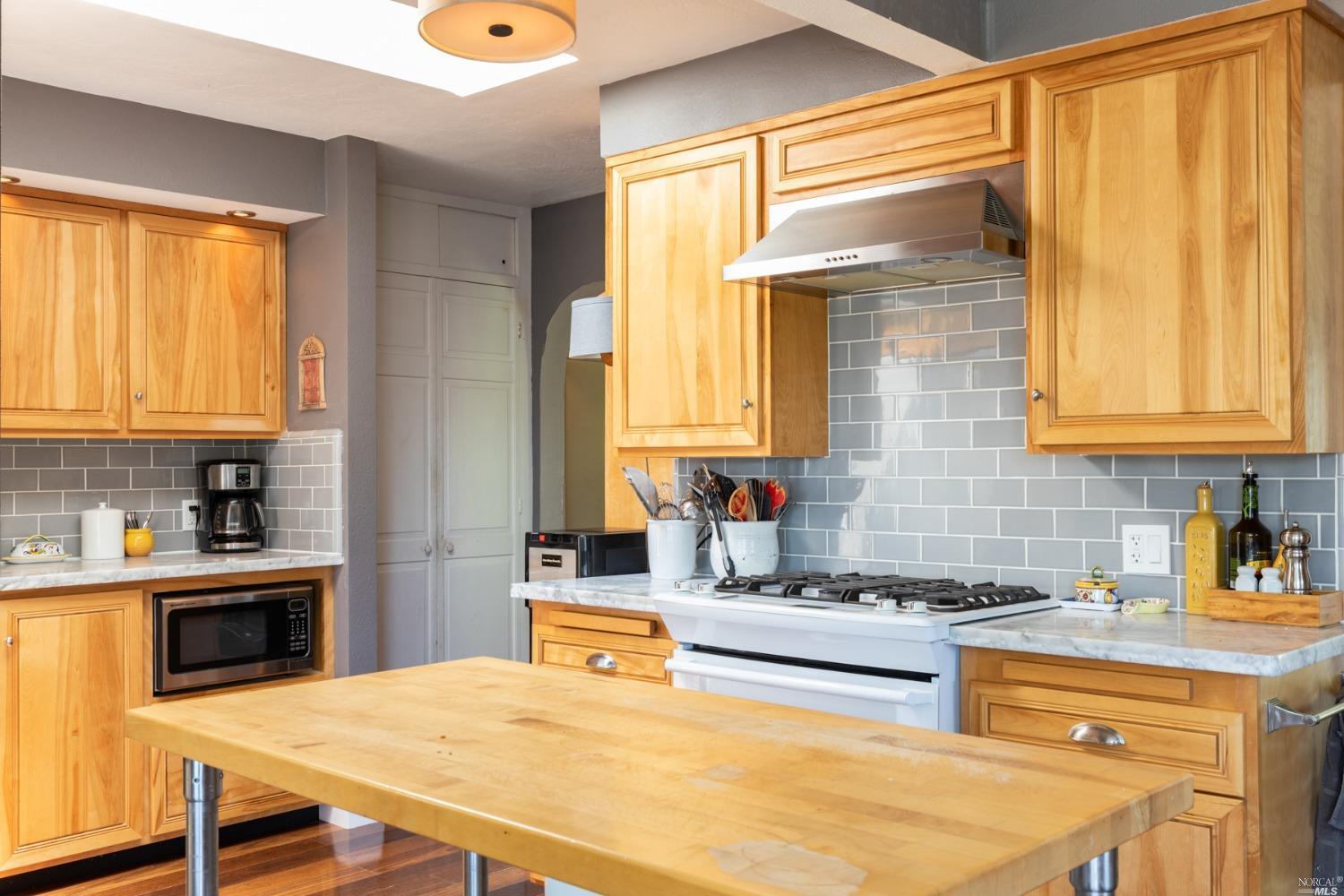 4141 Shook Road Sebastopol, CA 95472 - Photo 1 of 1 a kitchen with a stove a sink and a refrigerator
