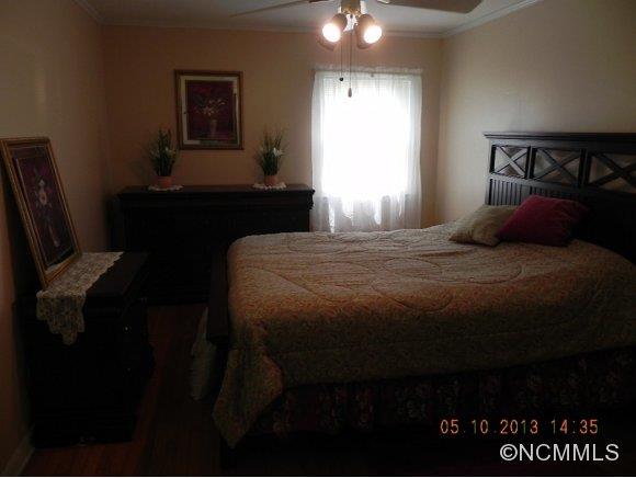 331 Edwards Street Rutherfordton, NC 28139 - Photo 14 of 20 a bedroom with a bed and a window