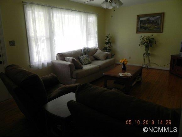 331 Edwards Street Rutherfordton, NC 28139 - Photo 7 of 20 a living room with furniture and a window