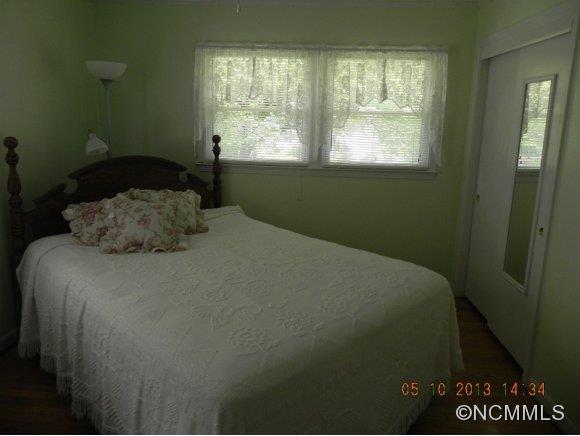 331 Edwards Street Rutherfordton, NC 28139 - Photo 10 of 20 a bedroom with a bed and window