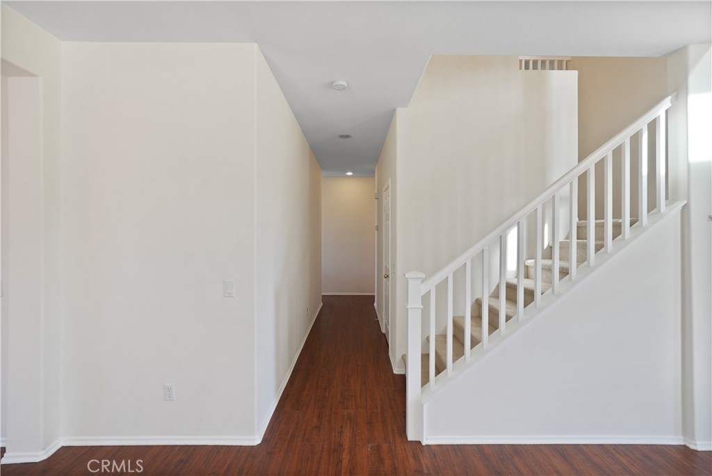 38815 Cobblestone Circle Murrieta, CA 92563 - Photo 16 of 49 a view of a hallway with staircase