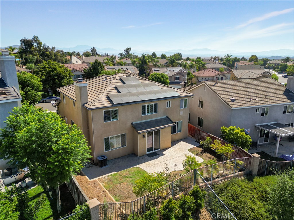 38815 Cobblestone Circle Murrieta, CA 92563 - Photo 19 of 49 an aerial view of a house with a yard