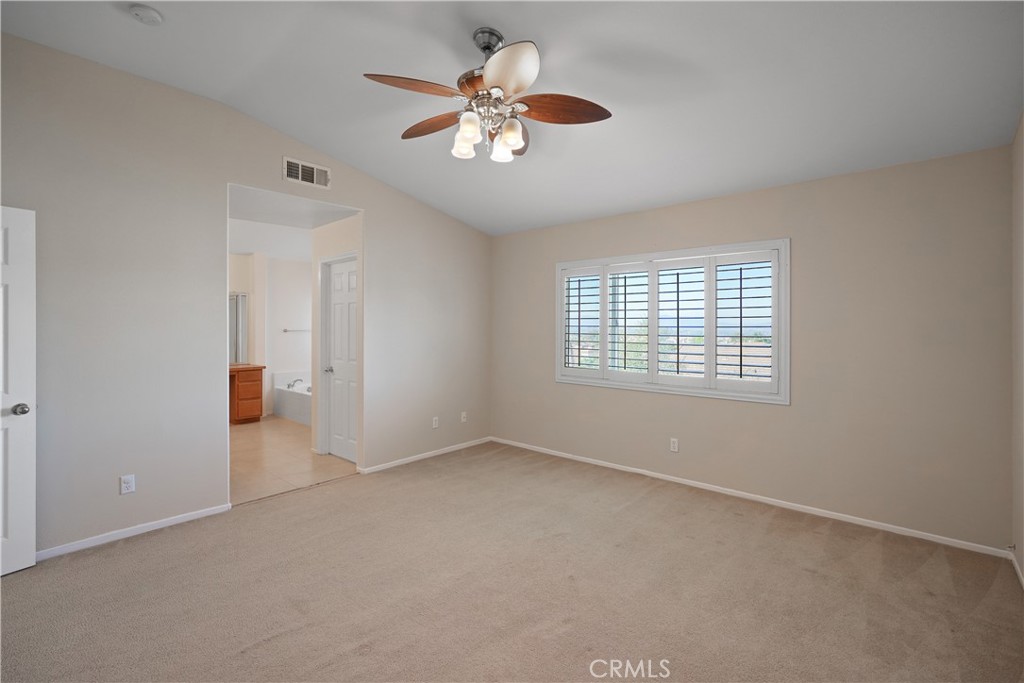 38815 Cobblestone Circle Murrieta, CA 92563 - Photo 25 of 49 wooden floor in an empty room with a window