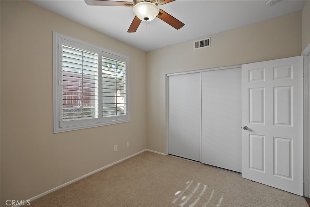 38815 Cobblestone Circle Murrieta, CA 92563 - Photo 34 of 49 a view of an empty room with a window