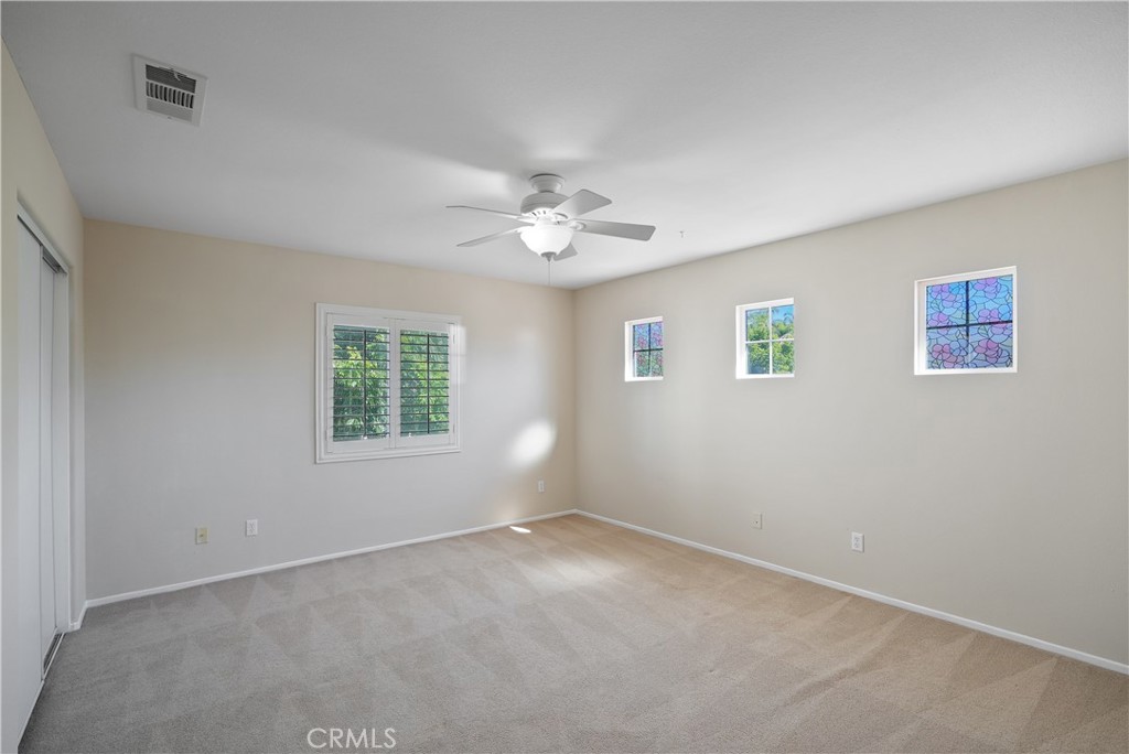 38815 Cobblestone Circle Murrieta, CA 92563 - Photo 37 of 49 a view of an empty room with a window