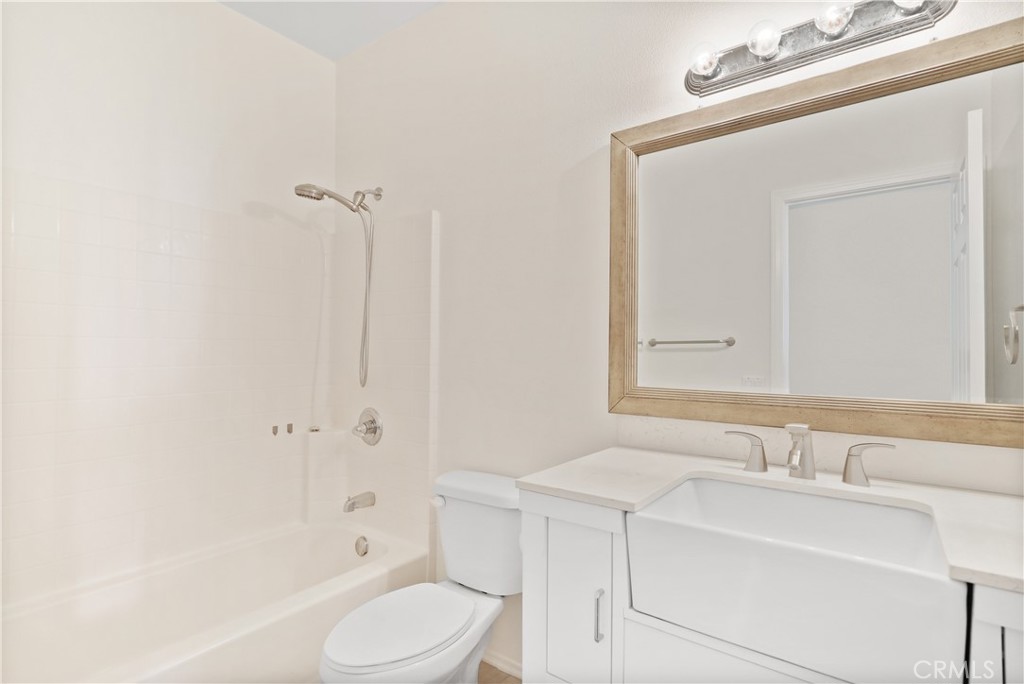 38815 Cobblestone Circle Murrieta, CA 92563 - Photo 43 of 49 a bathroom with a sink toilet and shower