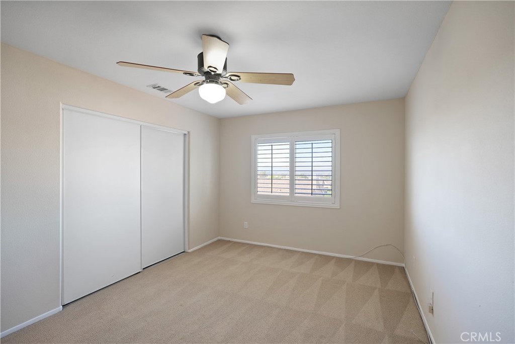 38815 Cobblestone Circle Murrieta, CA 92563 - Photo 46 of 49 a view of an empty room with a window