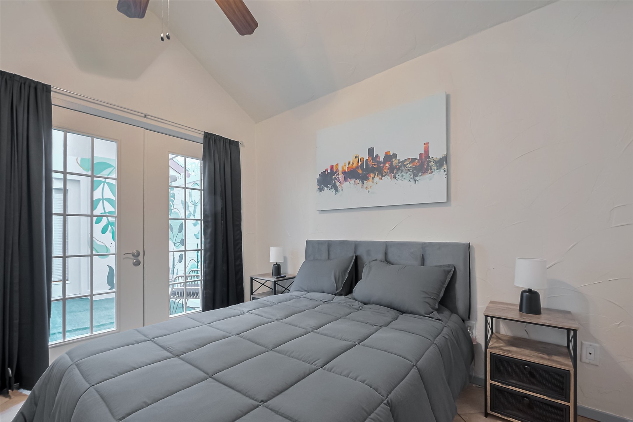 30411 Arborg Drive Spring, TX 77386 - Photo 21 of 30 a bedroom with a bed and a large window