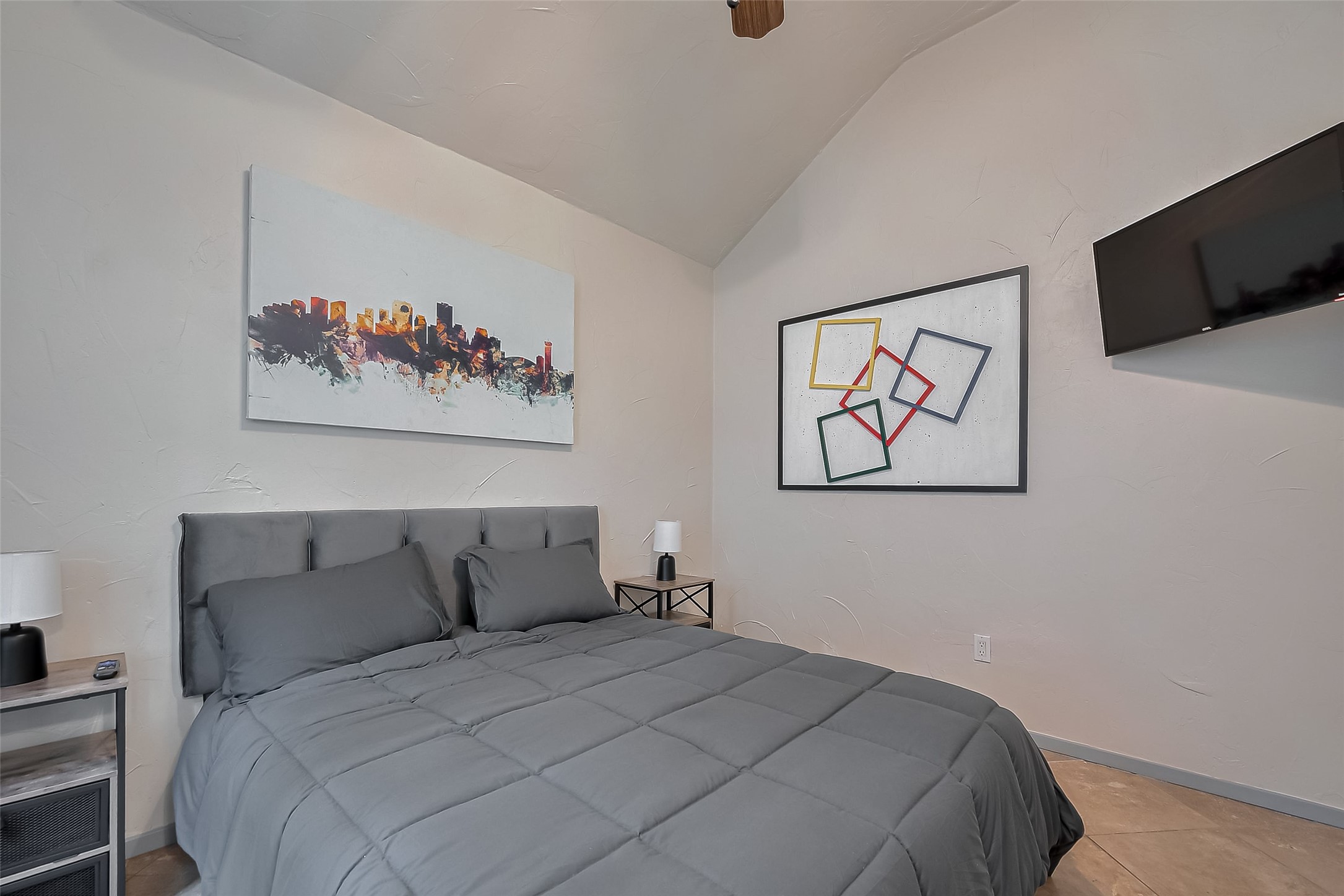 30411 Arborg Drive Spring, TX 77386 - Photo 22 of 30 a bedroom with a bed and a painting on the wall