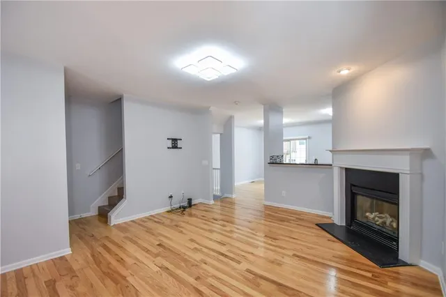 a kitchen with stainless steel appliances a refrigerator stove and microwave