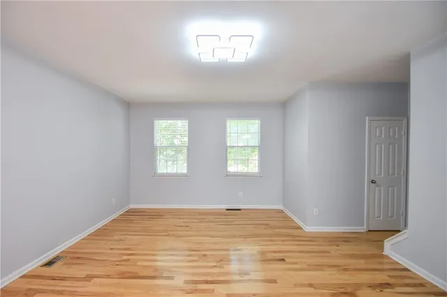 a kitchen with a sink stove and refrigerator