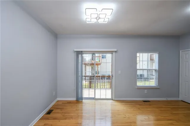 a bathroom with a shower and a toilet