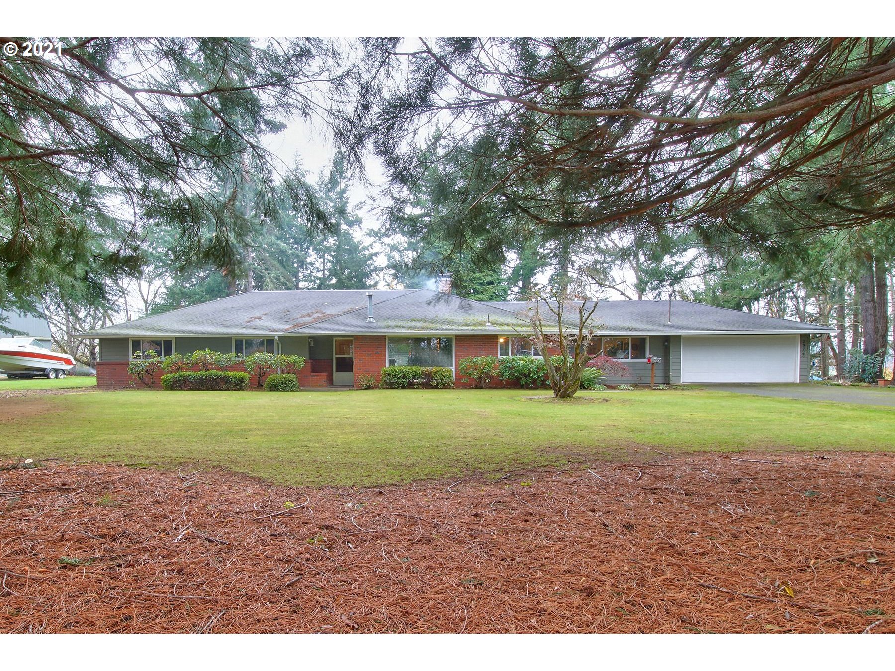 29223 South Meridian Road Hubbard, OR 97032 - Photo 1 of 32 a view of a big yard with a house