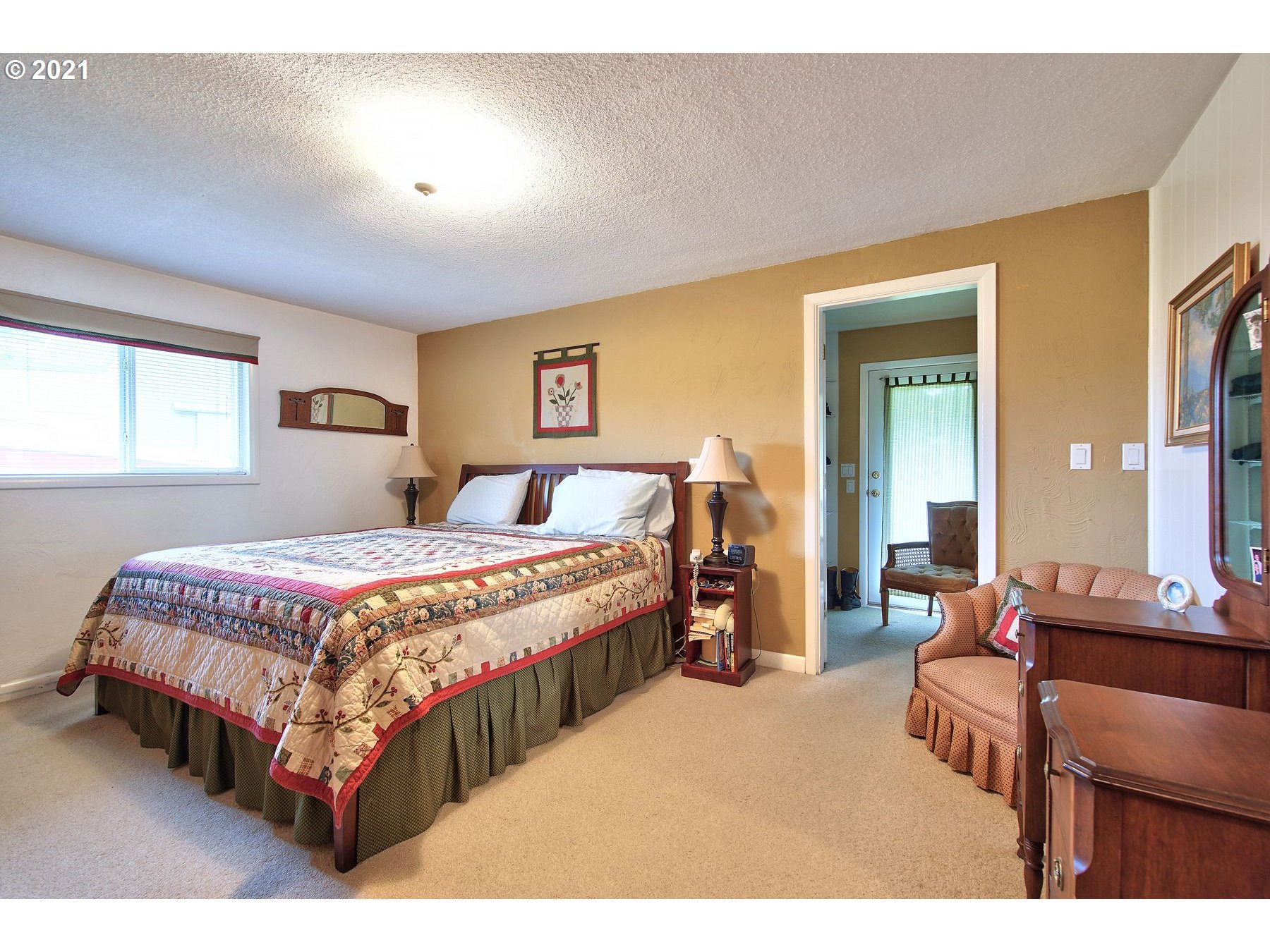 29223 South Meridian Road Hubbard, OR 97032 - Photo 19 of 32 a bedroom with a bed and window