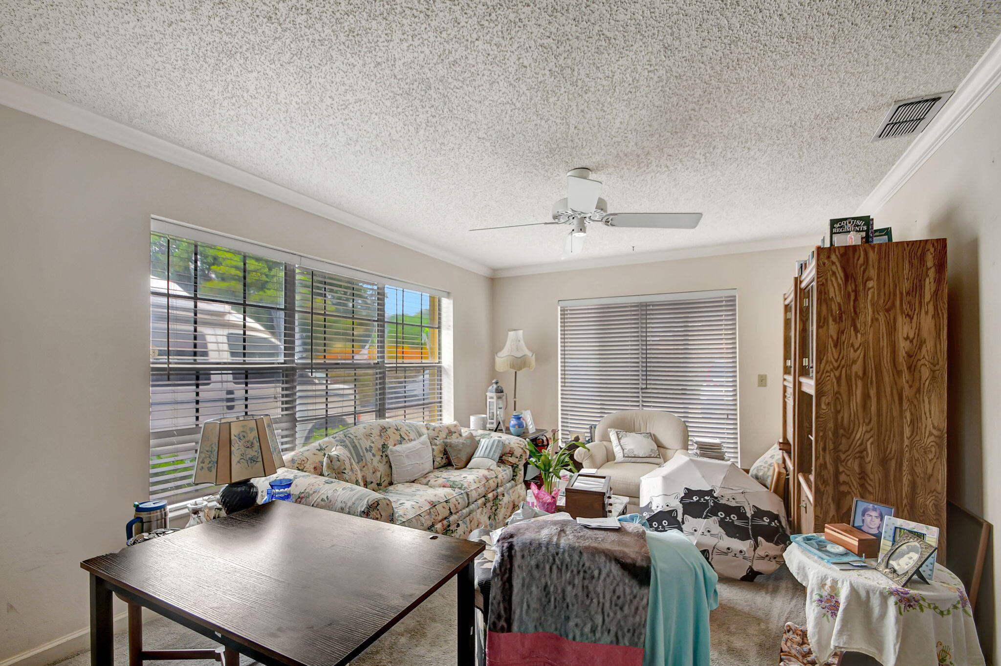 1853 Service Road North Palm Beach, FL 33408 - Photo 5 of 113 a living room with furniture and a window