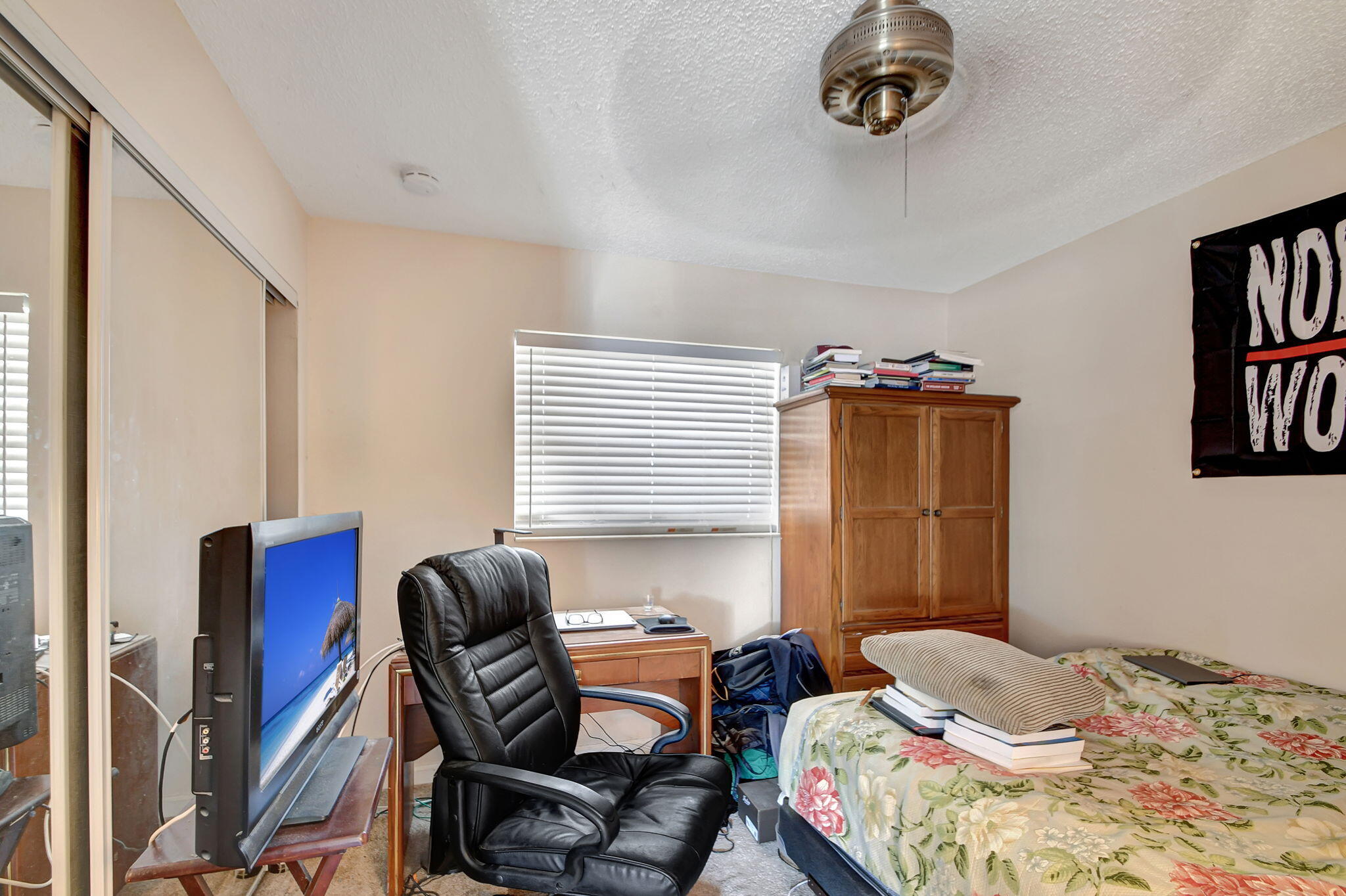 1853 Service Road North Palm Beach, FL 33408 - Photo 74 of 113 a bedroom with a bed and a window