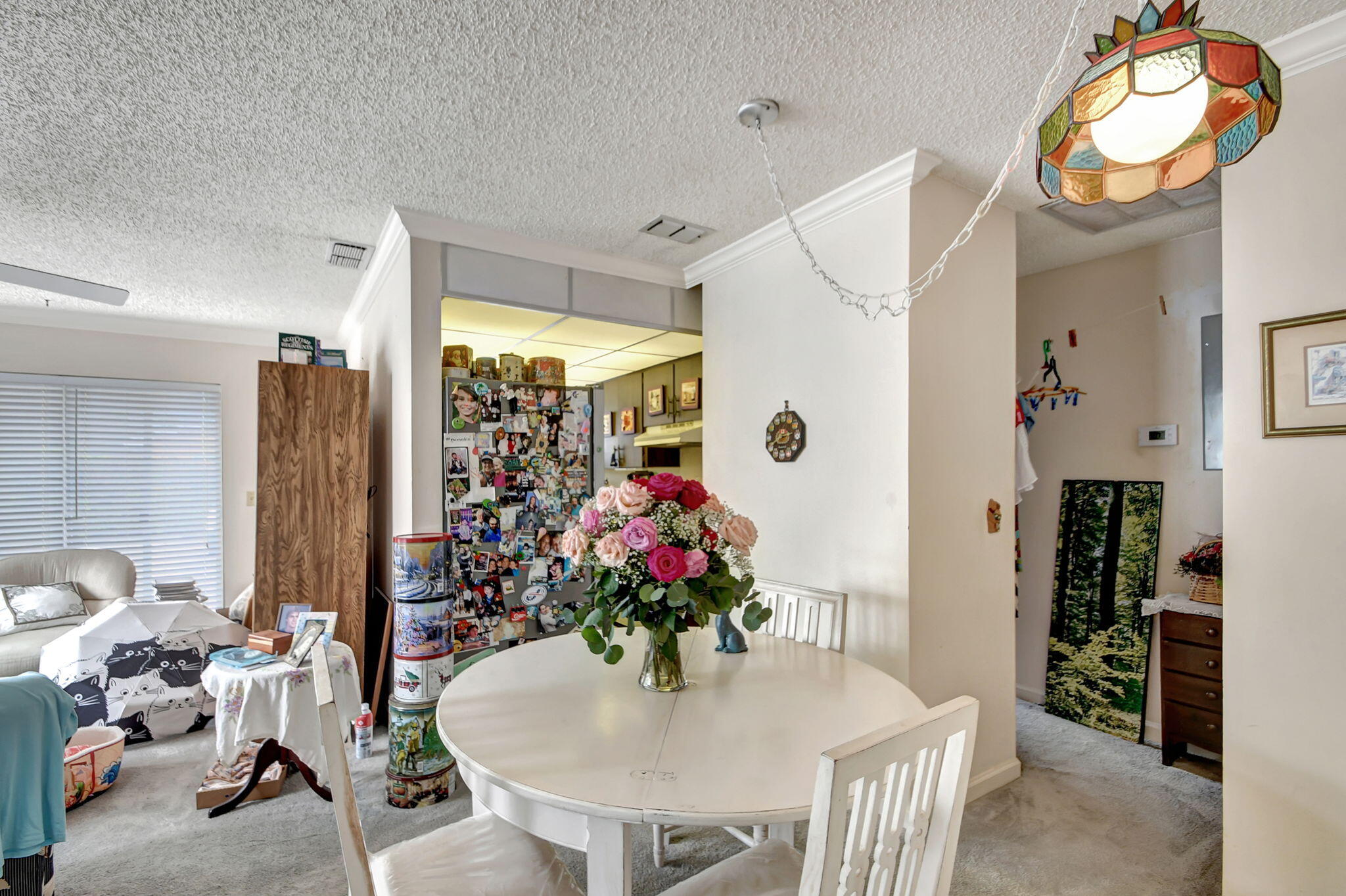 1853 Service Road North Palm Beach, FL 33408 - Photo 8 of 113 a dining room with furniture potted plants and wooden floor
