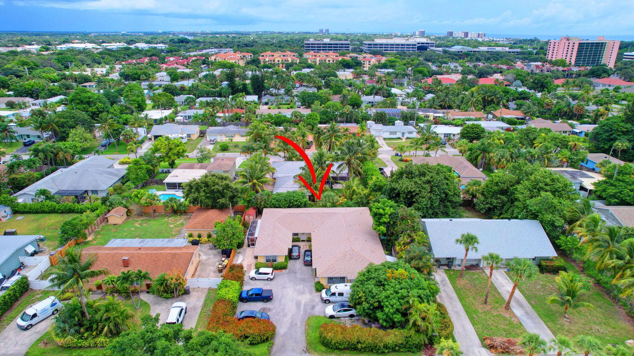 1853 Service Road North Palm Beach, FL 33408 - Photo 88 of 113 an aerial view of residential houses with outdoor space and trees