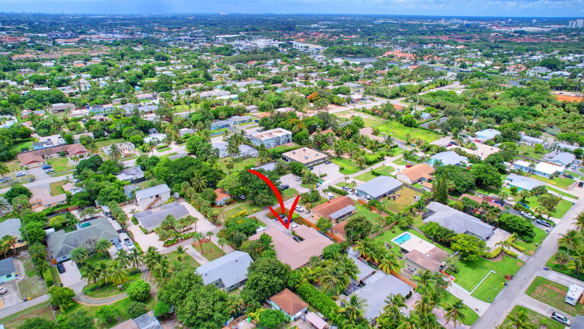 1853 Service Road North Palm Beach, FL 33408 - Photo 96 of 113 an aerial view of residential houses with outdoor space