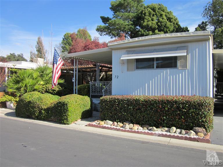 1225 South Rice Road, Unit 72 Ojai, CA 93023 - Photo 1 of 9 a front view of a house with a yard