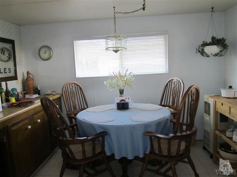 1225 South Rice Road, Unit 72 Ojai, CA 93023 - Photo 4 of 9 a dining room with furniture and window