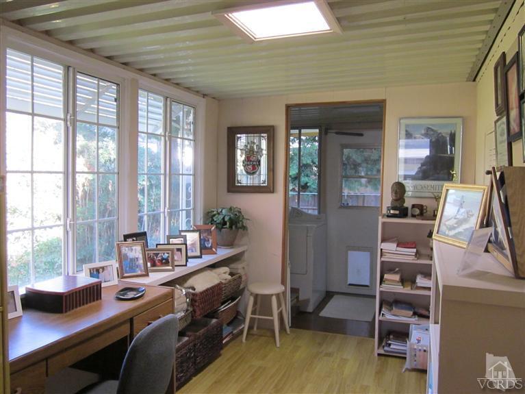 1225 South Rice Road, Unit 72 Ojai, CA 93023 - Photo 6 of 9 a room with furniture a large window and furniture