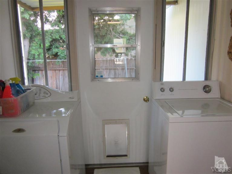 1225 South Rice Road, Unit 72 Ojai, CA 93023 - Photo 7 of 9 a bathroom with a sink and mirror