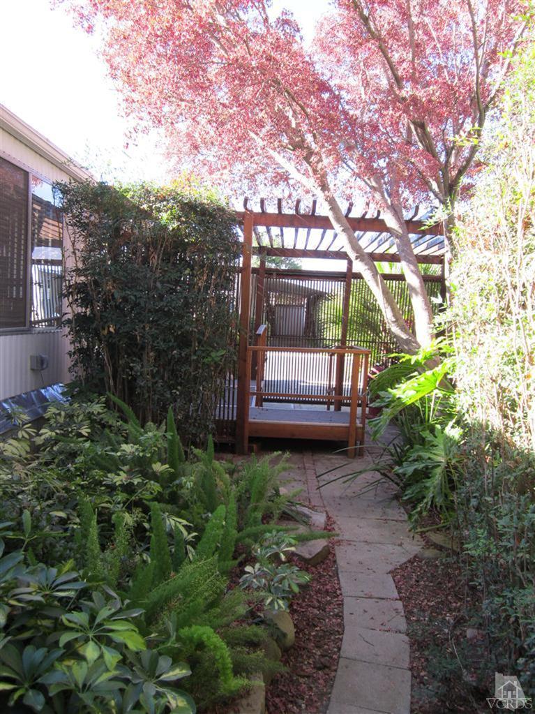 1225 South Rice Road, Unit 72 Ojai, CA 93023 - Photo 9 of 9 a view of a backyard with sitting area