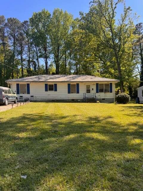 4133 Canby Lane Decatur, GA 30035 - Photo 1 of 1 a view of a house with a swimming pool