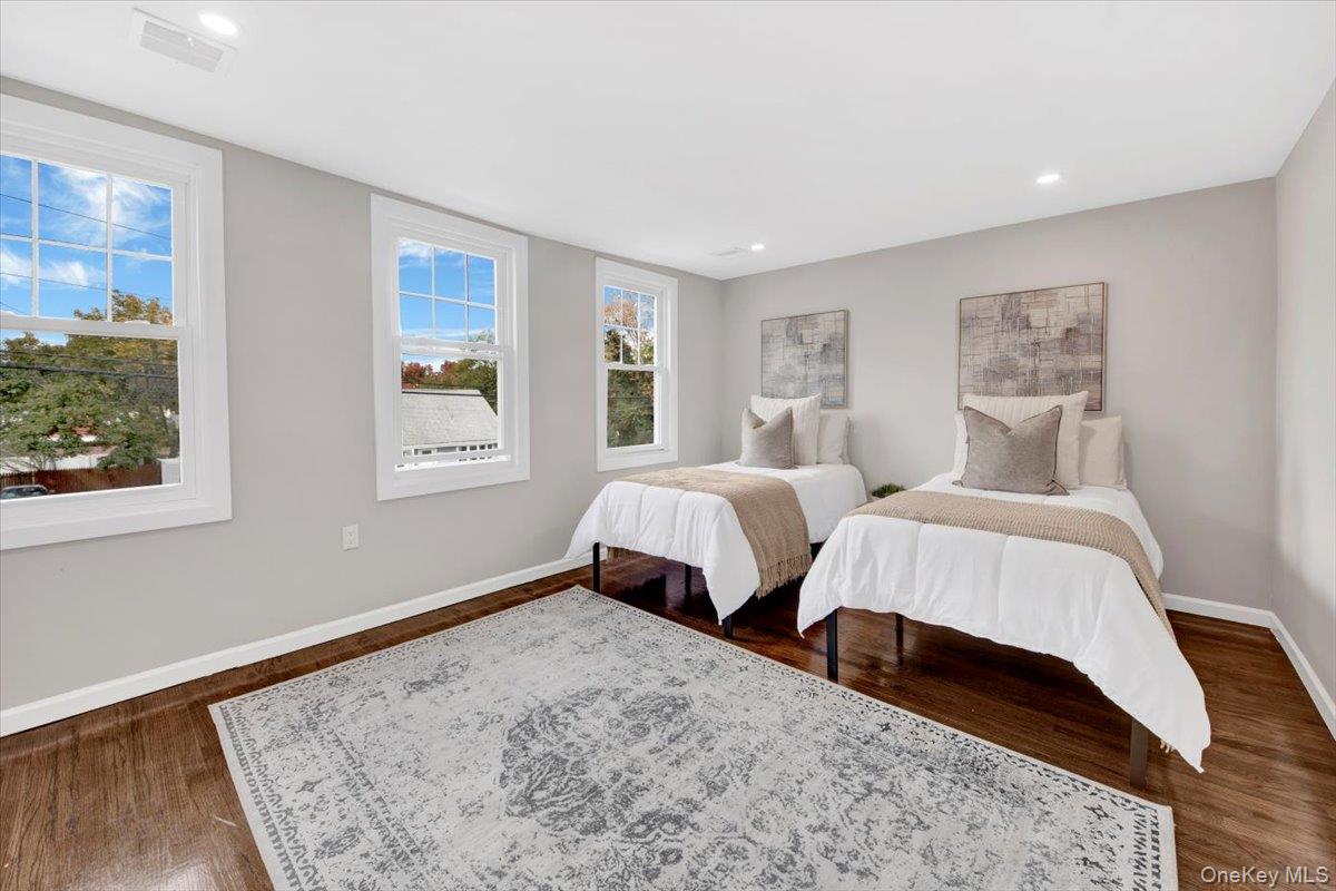 34 Kings Ferry Road Montrose, NY 10548 - Photo 18 of 36 Bedroom featuring dark wood finished floors and recessed lighting