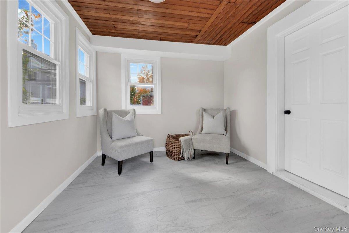 34 Kings Ferry Road Montrose, NY 10548 - Photo 30 of 36 Living area featuring wood ceiling and baseboards