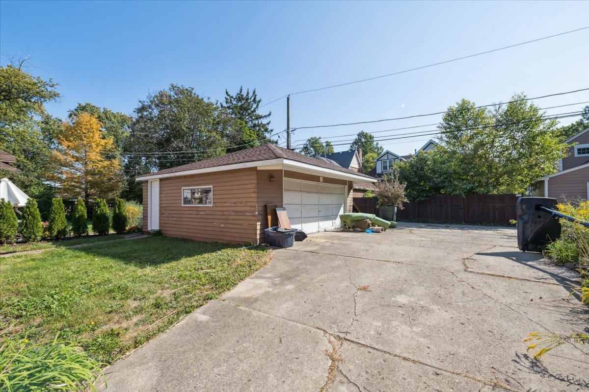 1009 South Washington Avenue Park Ridge, IL 60068 - Photo 19 of 24 a view of a house with a yard