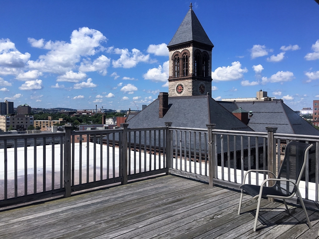 12 Inman Street, Unit 52 Cambridge, MA 02139 - Photo 9 of 12 a view of a roof deck