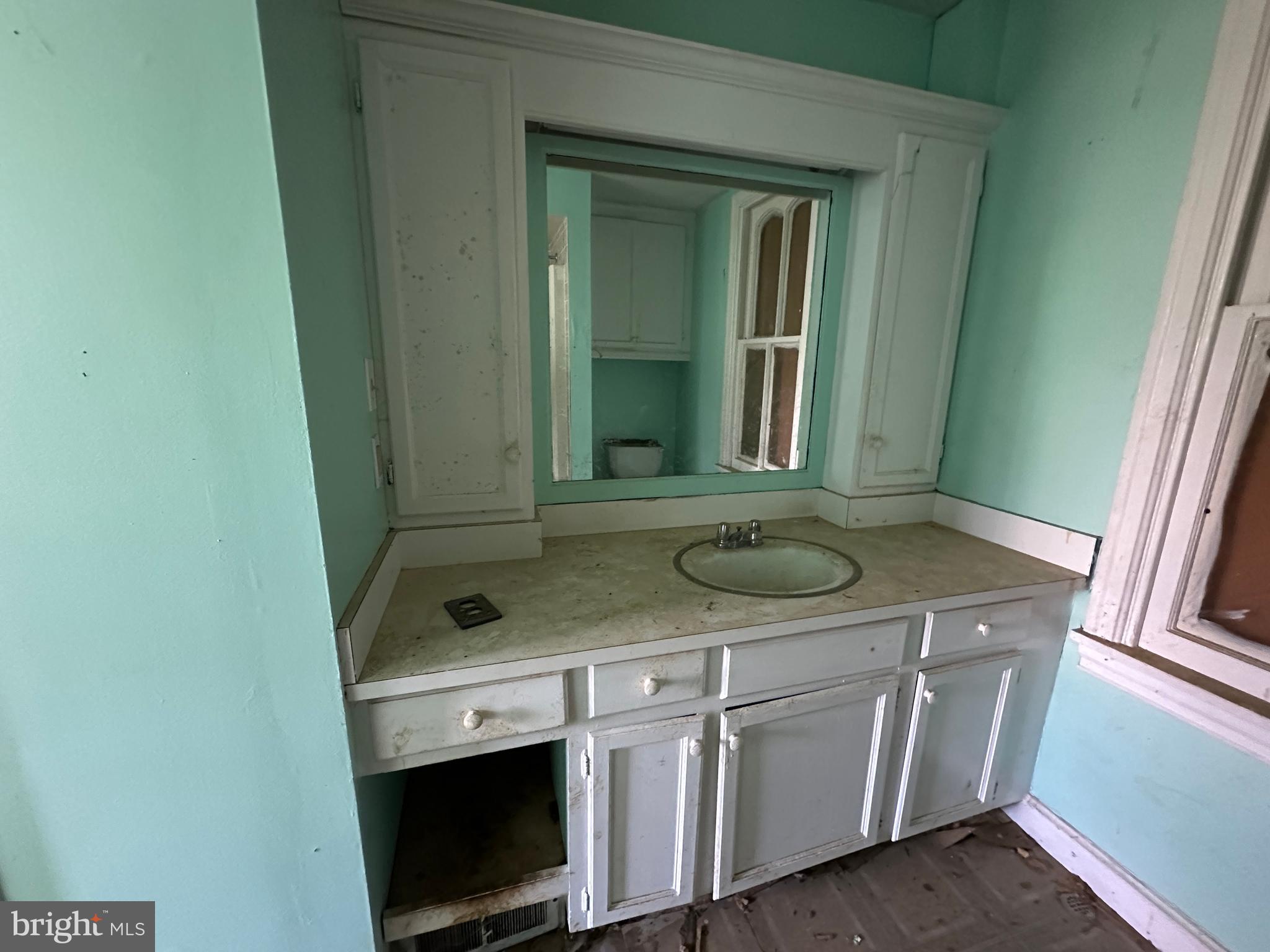 12007 White Hall Road Chewsville, MD 21783 - Photo 32 of 42 a bathroom with a sink and a mirror