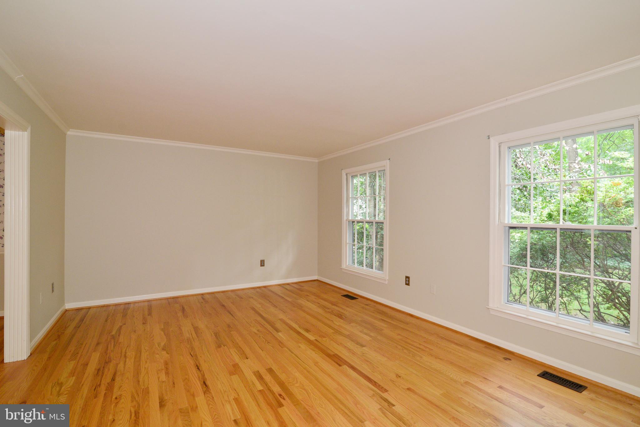 11480 Bingham Terrace Reston, VA 20191 - Photo 9 of 48 Living Room with two large windows and hardwoods.