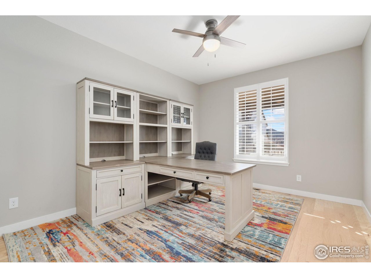 2883 Storm View Court Timnath, CO 80547 - Photo 11 of 36 a view of a workspace with furniture and a window