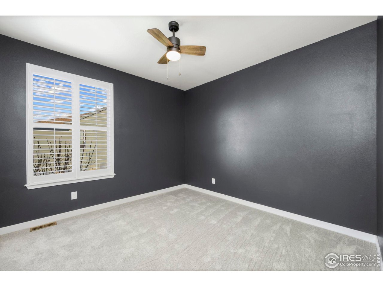 2883 Storm View Court Timnath, CO 80547 - Photo 14 of 36 a view of an empty room with a window