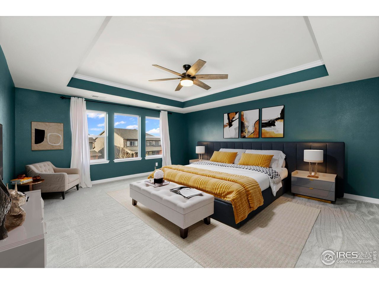 2883 Storm View Court Timnath, CO 80547 - Photo 16 of 36 a spacious bedroom with a bed and wooden floor