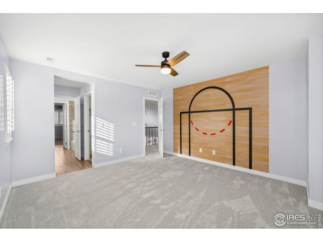 2883 Storm View Court Timnath, CO 80547 - Photo 24 of 36 a view of an empty room with a window