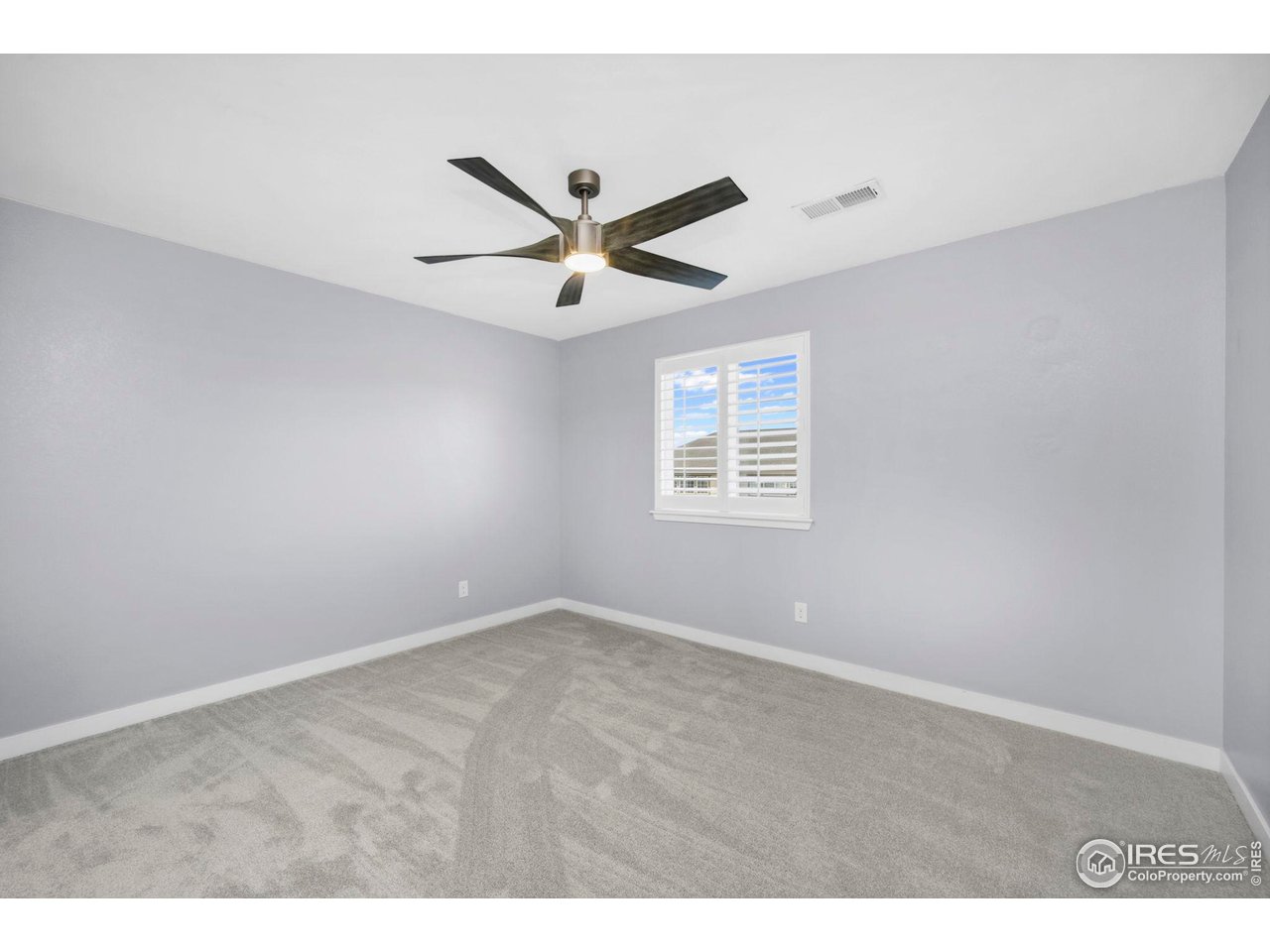 2883 Storm View Court Timnath, CO 80547 - Photo 27 of 36 a view of an empty room