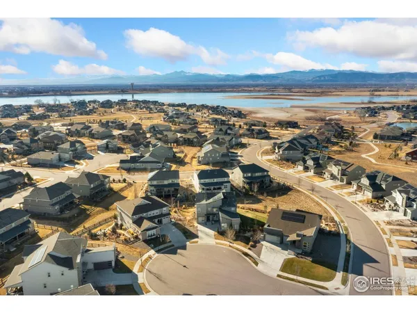 an aerial view of residential building with ocean view