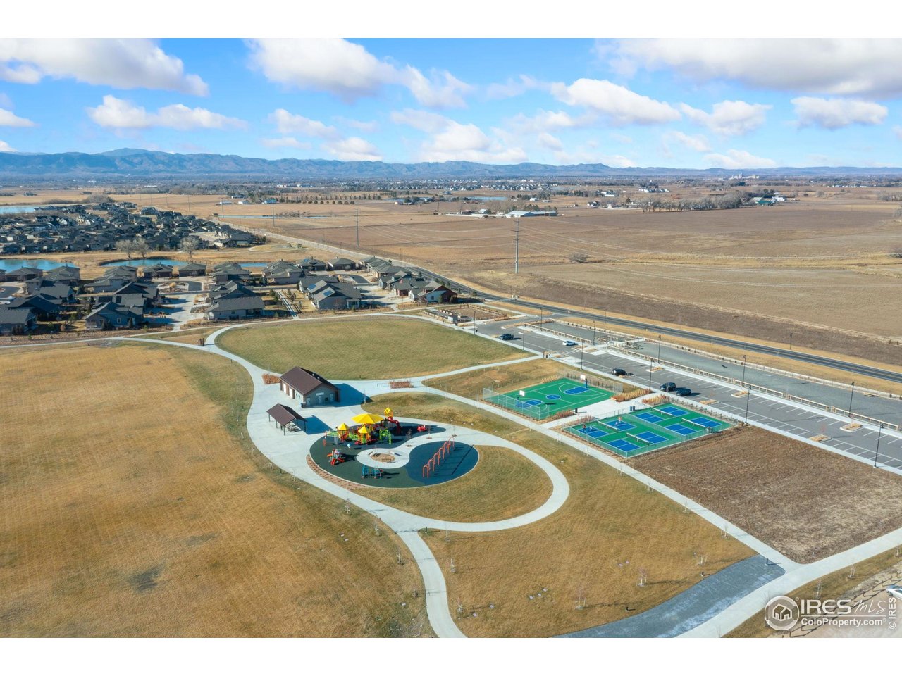 2883 Storm View Court Timnath, CO 80547 - Photo 35 of 36 Community sport fields, play structures, pickle ball courts, basketball courts and dog park!