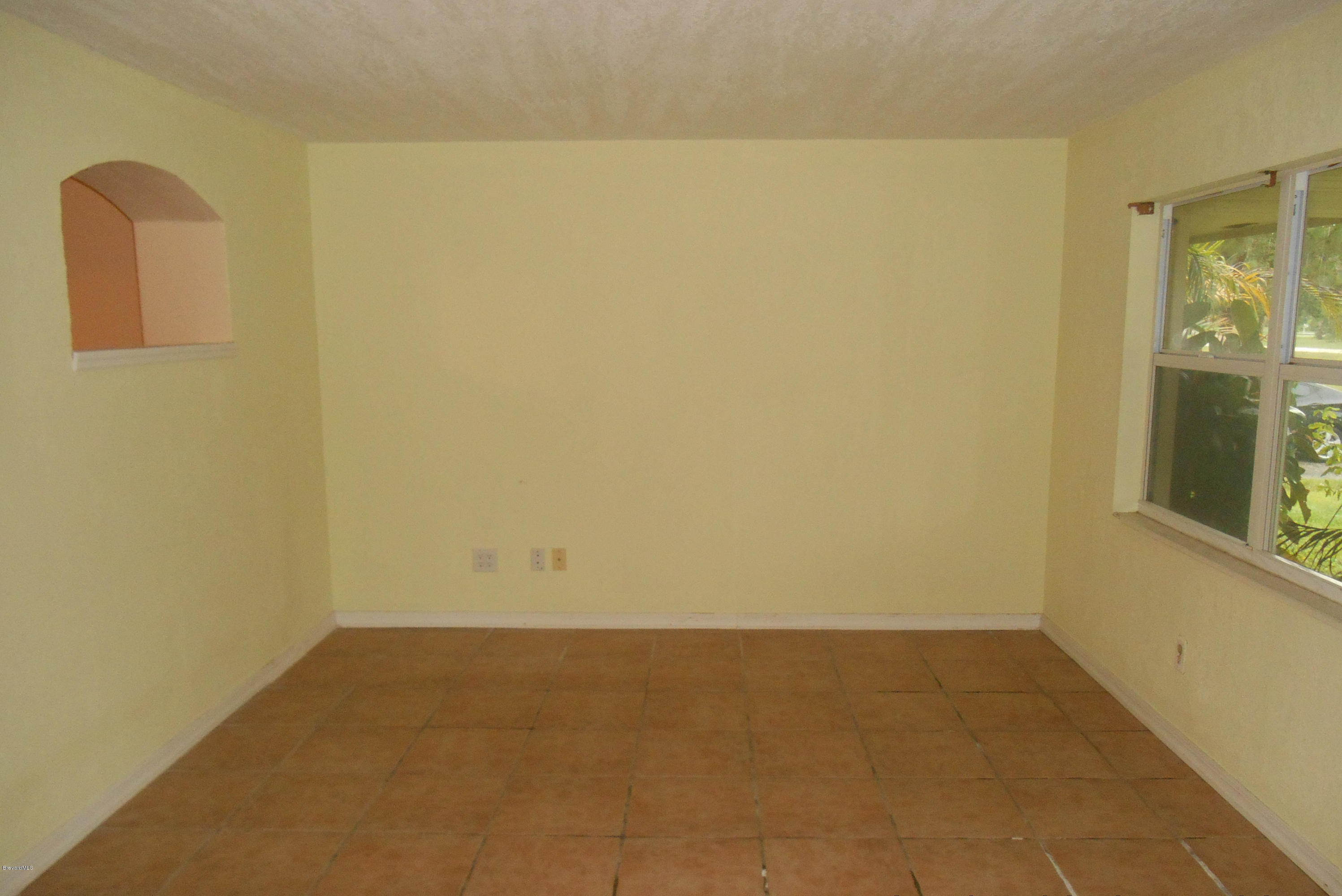 2780 Lakehill Road Melbourne, FL 32934 - Photo 3 of 13 LIVING RM 2