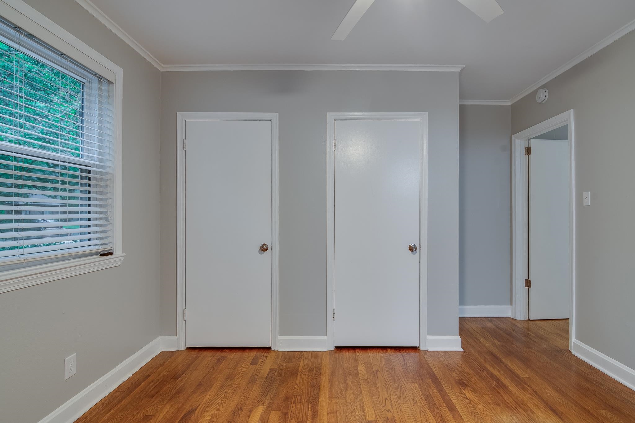 4970 Sequoia Road Memphis, TN 38117 - Photo 15 of 31 a view of room with window and wooden floor