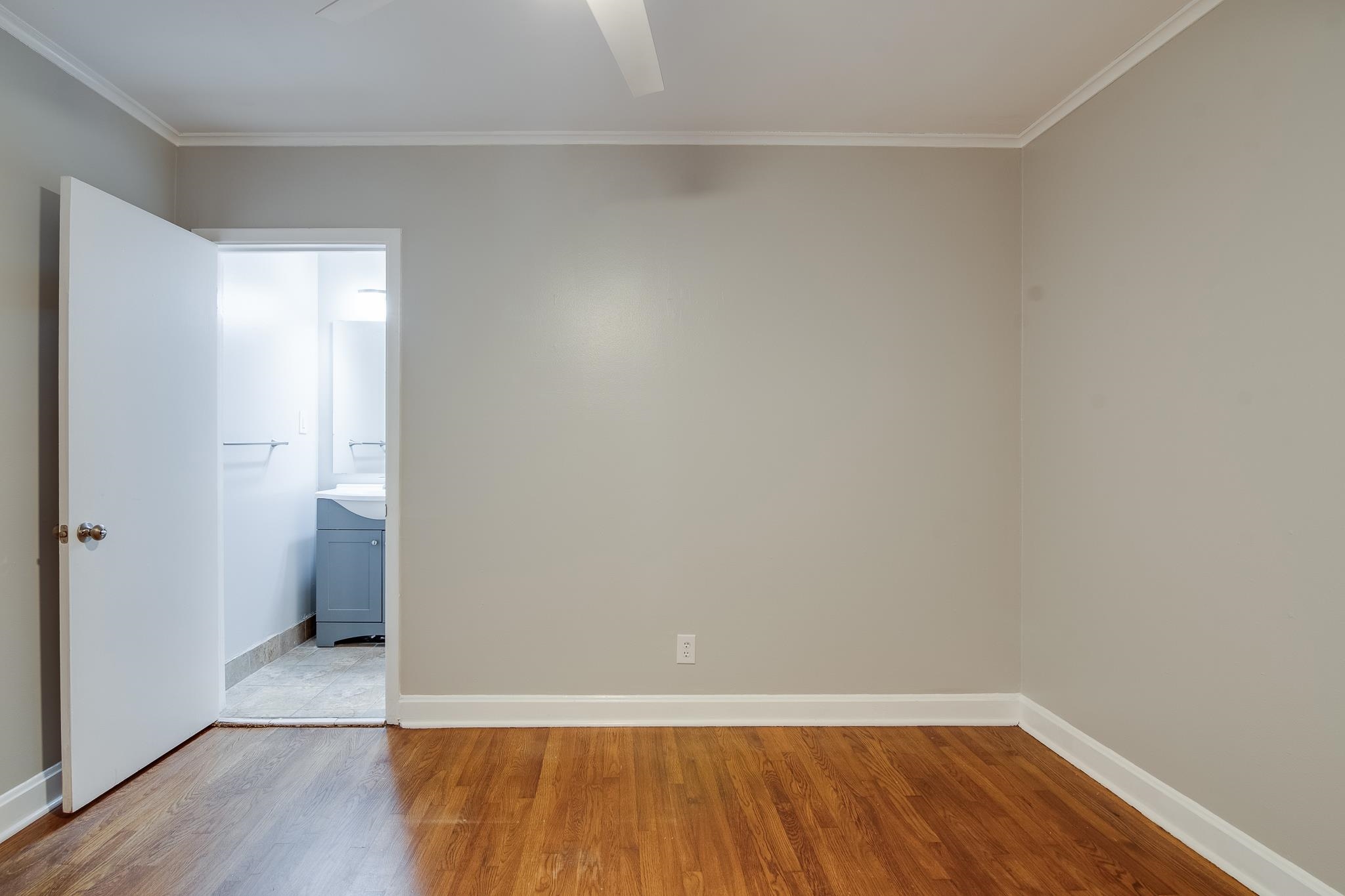 4970 Sequoia Road Memphis, TN 38117 - Photo 16 of 31 a view of an empty room with wooden floor