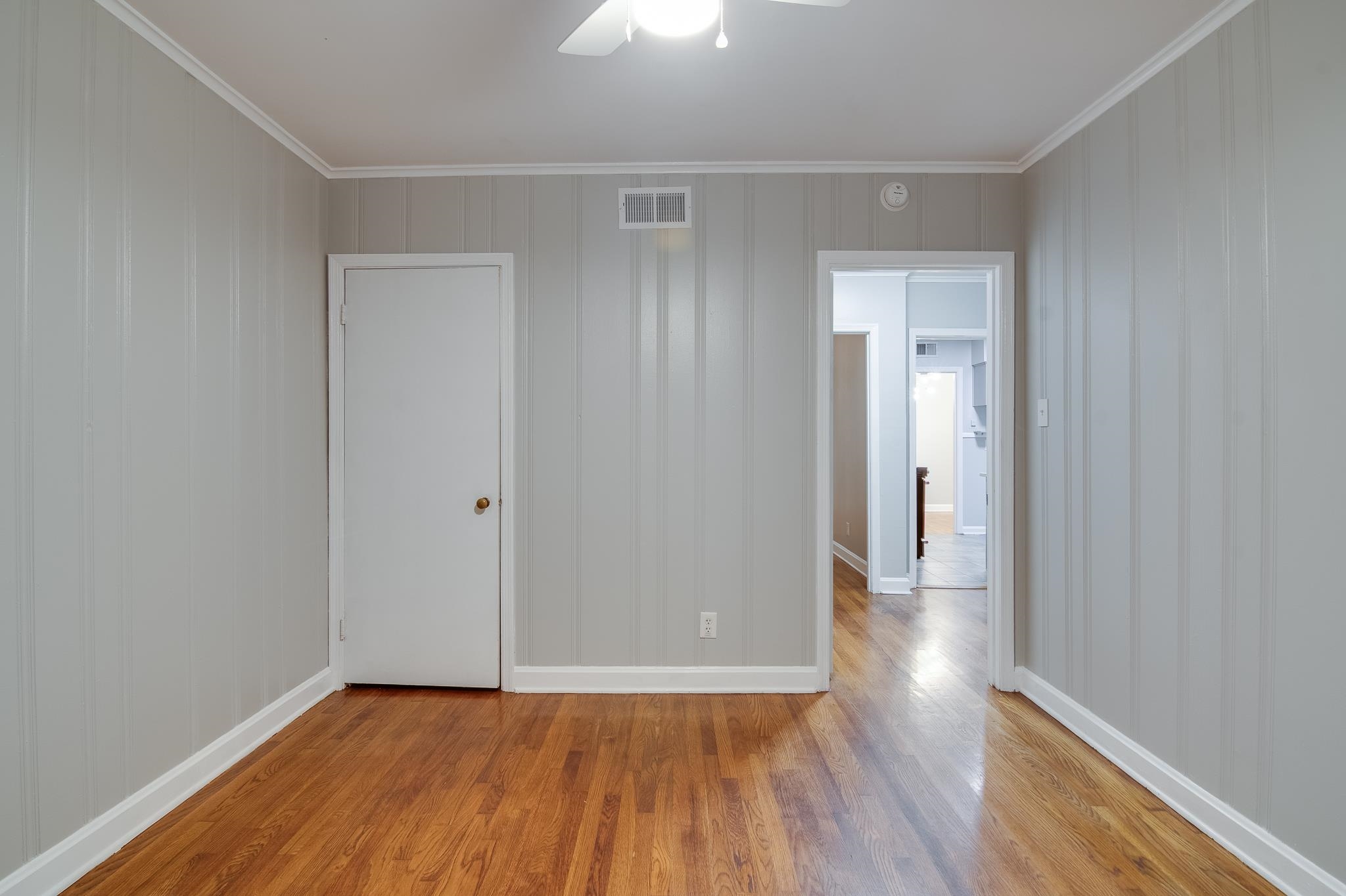 4970 Sequoia Road Memphis, TN 38117 - Photo 20 of 31 a view of an empty room and wooden floor
