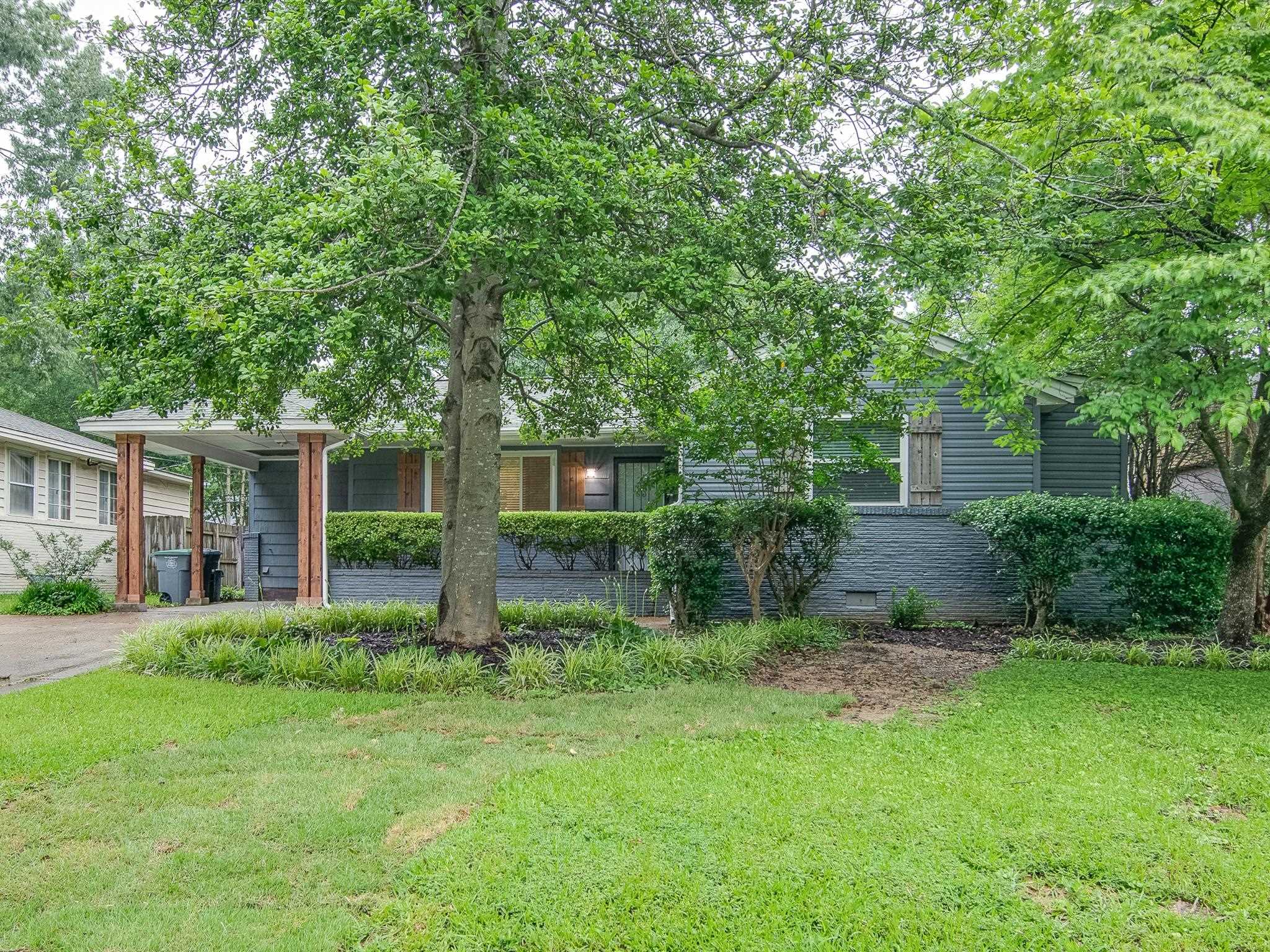4970 Sequoia Road Memphis, TN 38117 - Photo 2 of 31 front view of a house with a yard