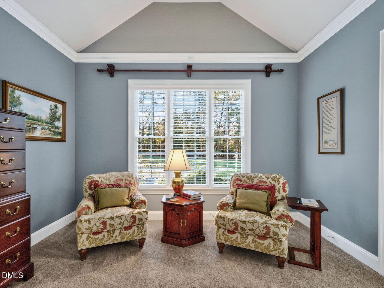 10312 Old Creedmoor Road Raleigh, NC 27613 - Photo 16 of 40 a living room with furniture and a window